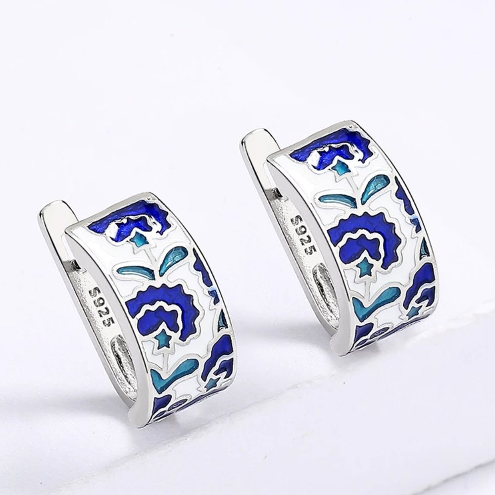 Sterling silver earrings with blue acrylic accents. - Picture 3 of 5